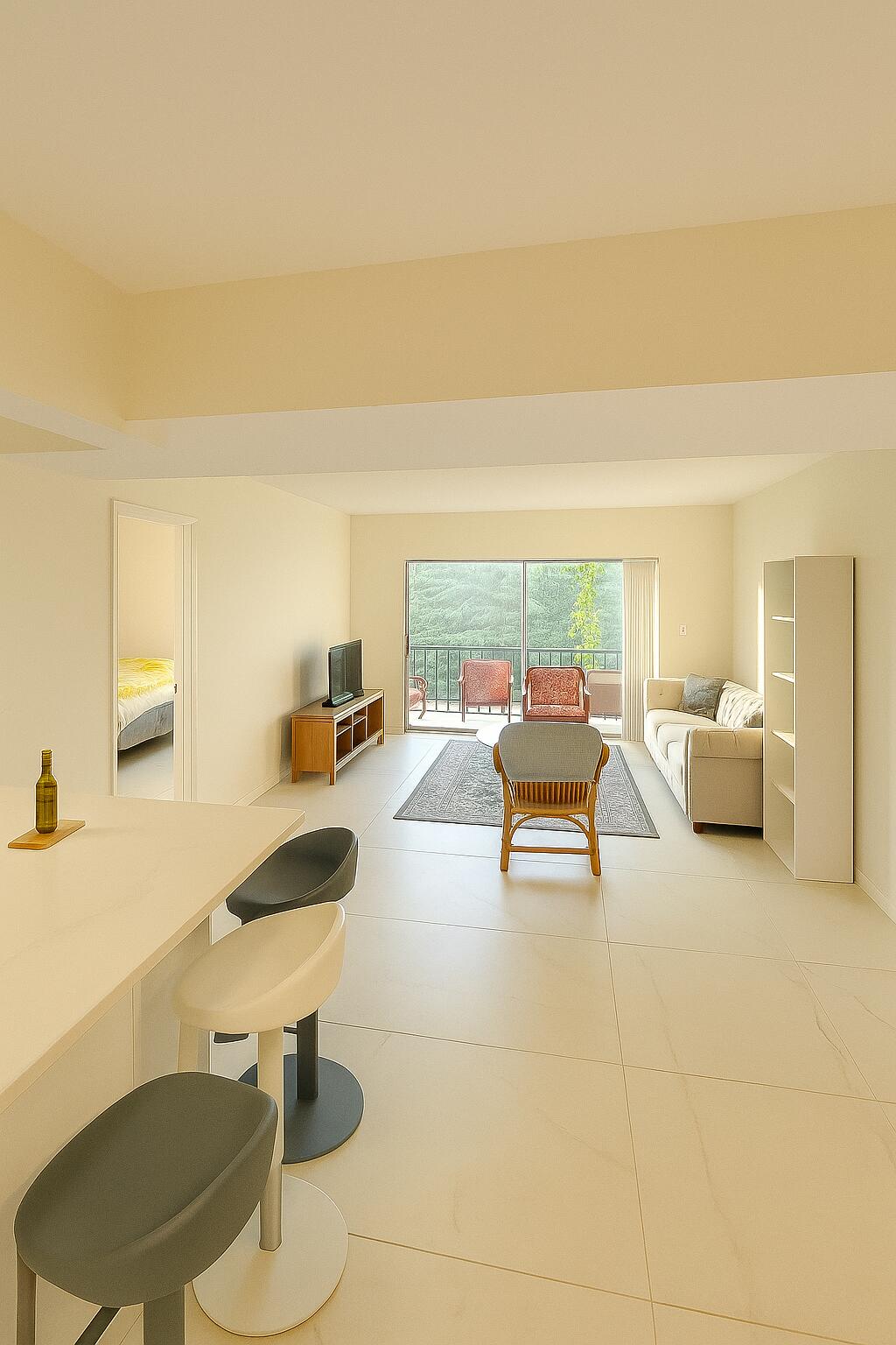 a living room with furniture and a table