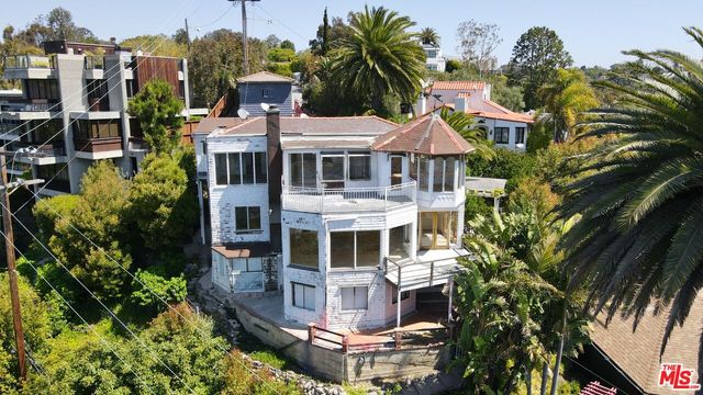a aerial view of a house with a garden