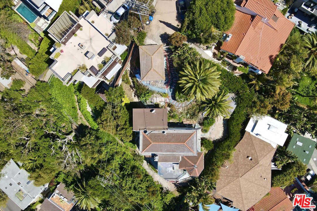 389 Upper Mesa Road Santa Monica, CA 90402 - Photo 6 of 10 an aerial view of a house with a yard and garden
