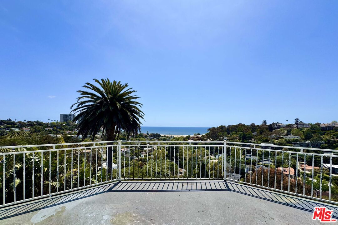 389 Upper Mesa Road Santa Monica, CA 90402 - Photo 10 of 10 a view of a balcony with floor to city view