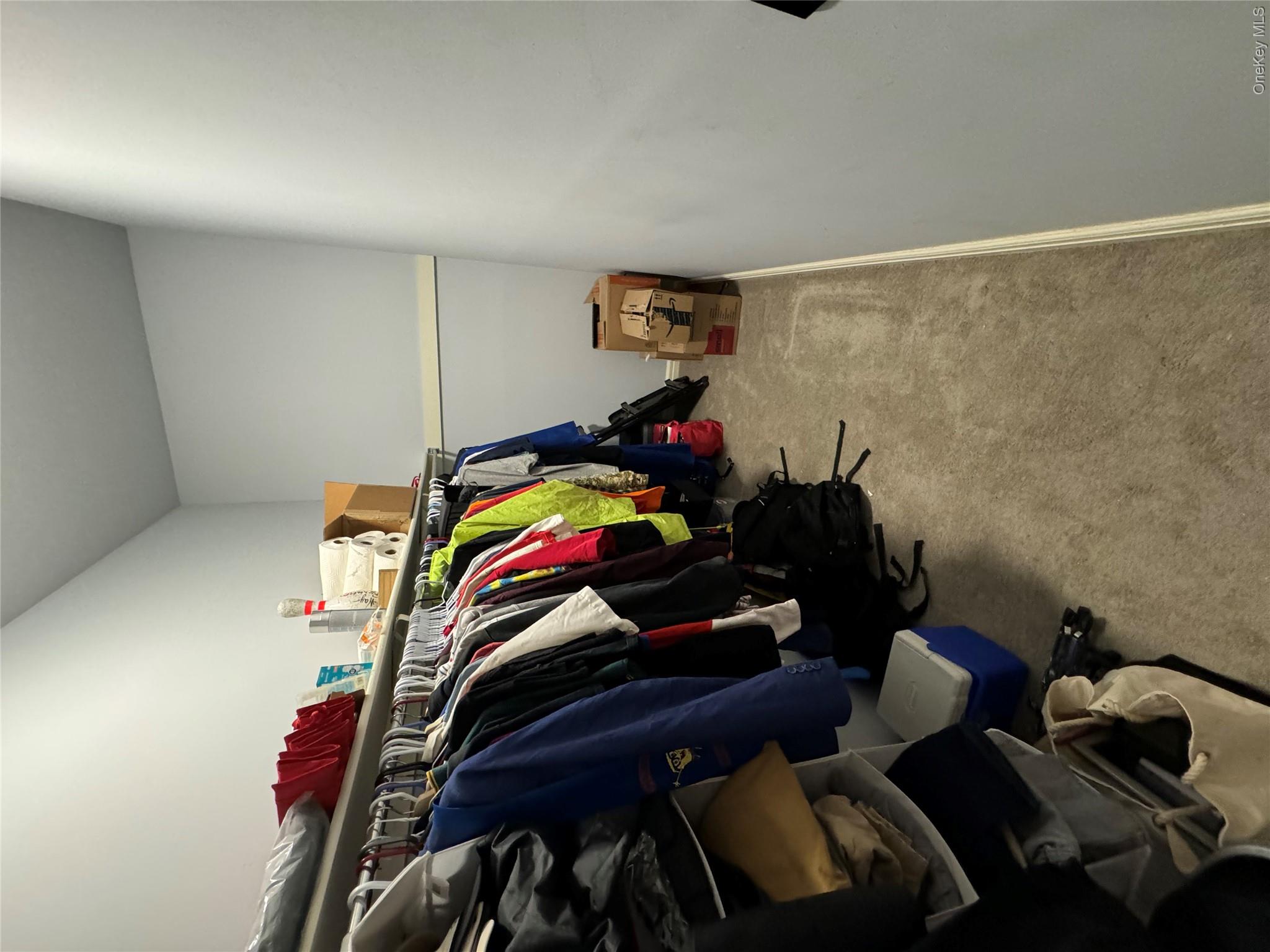 1701 Crompond Road, Unit 6313 Peekskill, NY 10566 - Photo 11 of 13 a view of walk in closet with clothes and shoes