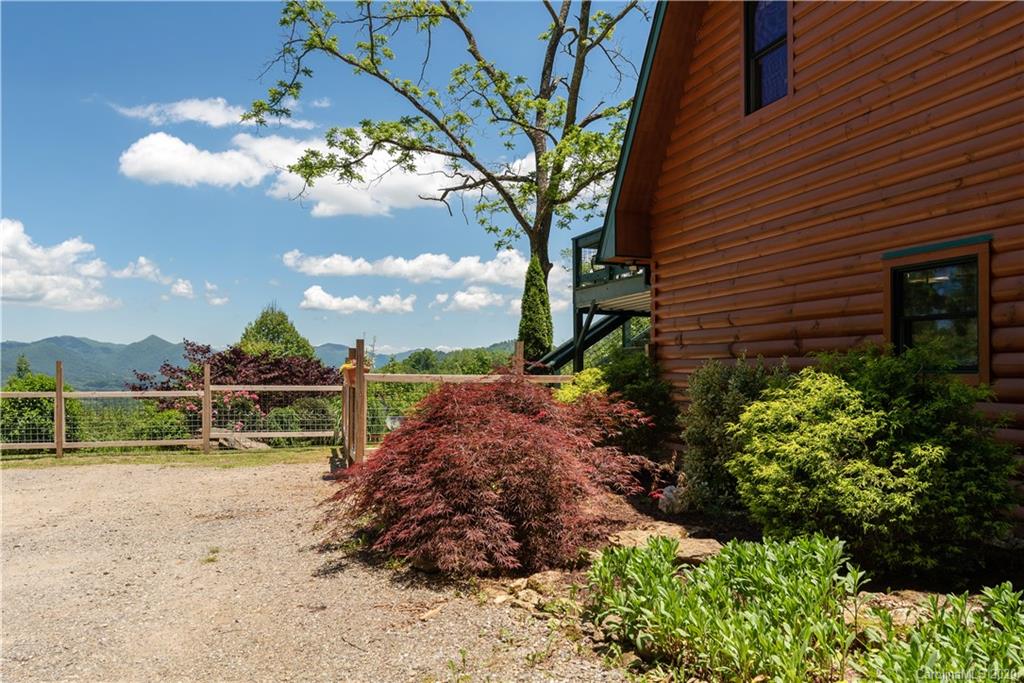 211 Lagrange Road, Unit TRACK 2 Waynesville, NC 28786 - Photo 2 of 48 a view of a garden