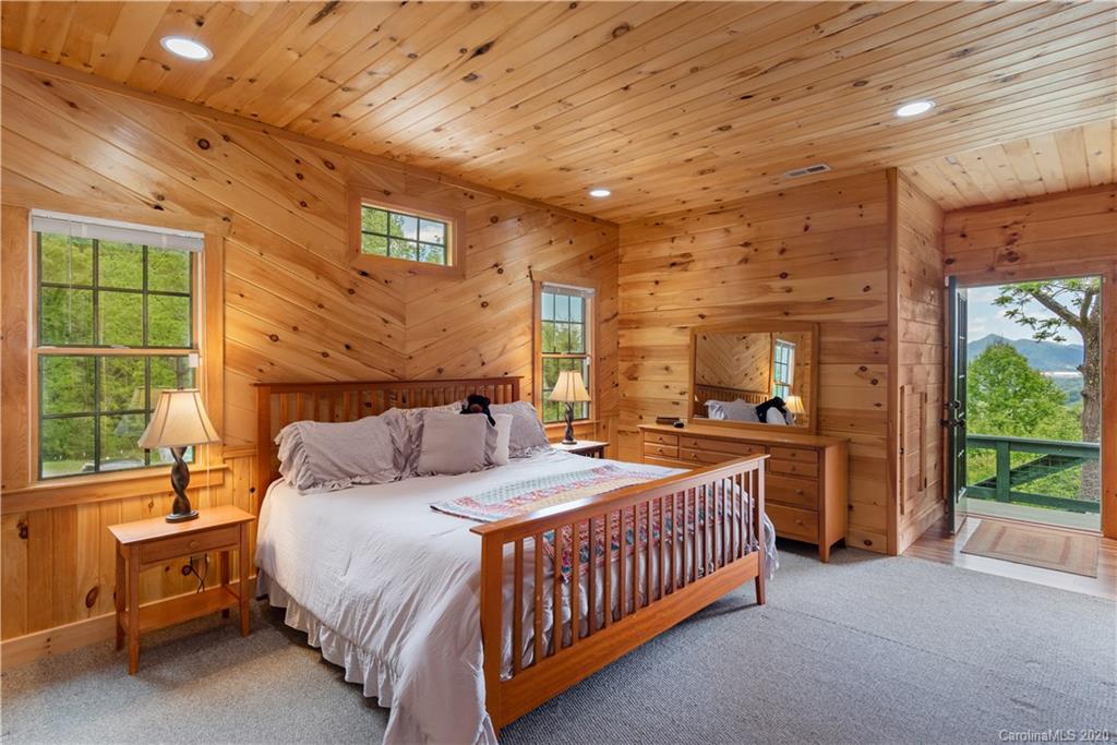 211 Lagrange Road, Unit TRACK 2 Waynesville, NC 28786 - Photo 20 of 48 a bedroom with a bed and a large window