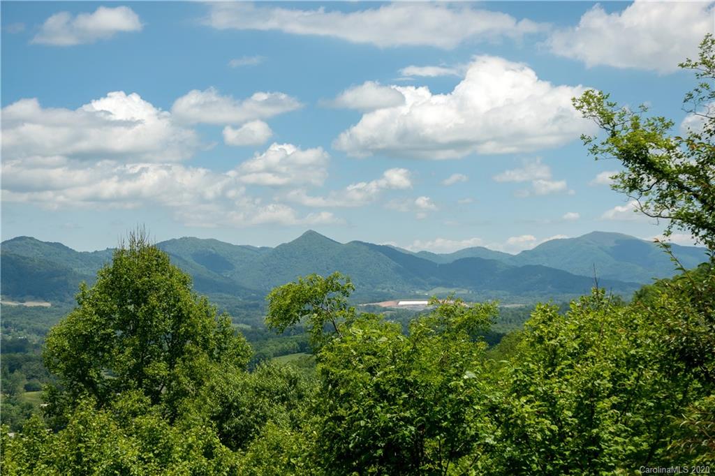 211 Lagrange Road, Unit TRACK 2 Waynesville, NC 28786 - Photo 22 of 48 a view of a lake in middle of forest