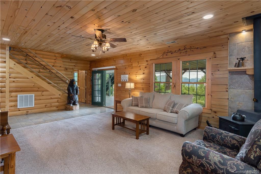 211 Lagrange Road, Unit TRACK 2 Waynesville, NC 28786 - Photo 26 of 48 a living room with furniture and a fireplace