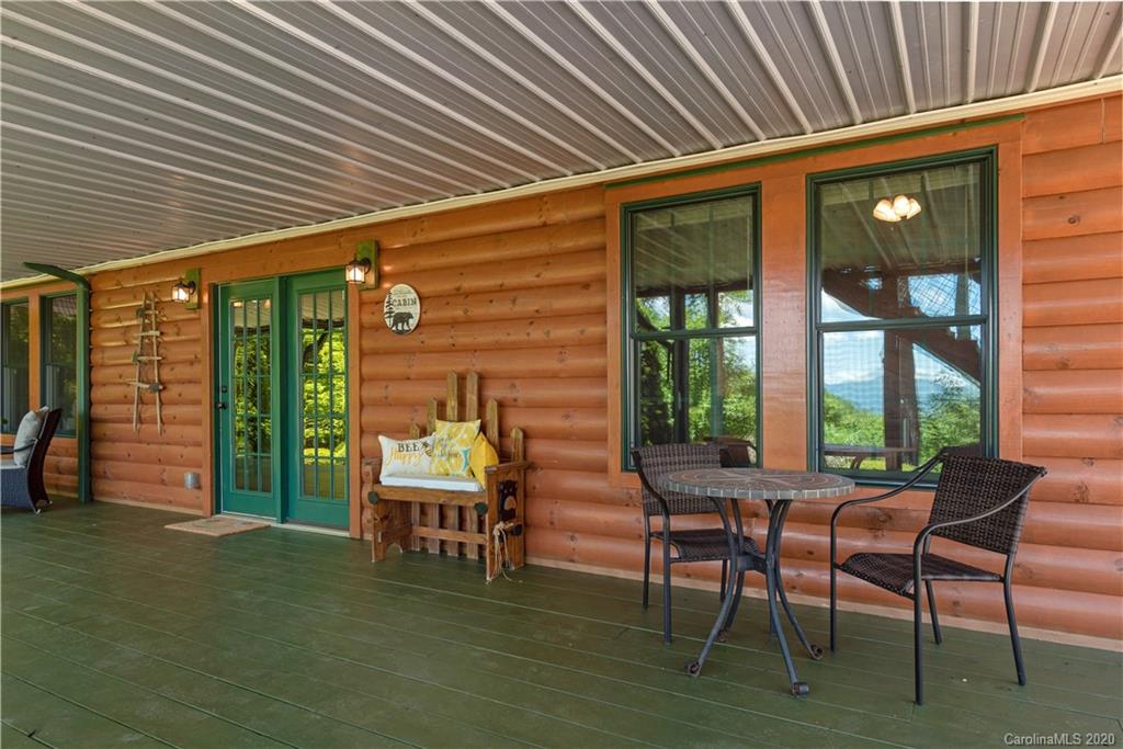 211 Lagrange Road, Unit TRACK 2 Waynesville, NC 28786 - Photo 39 of 48 a balcony with furniture and a window