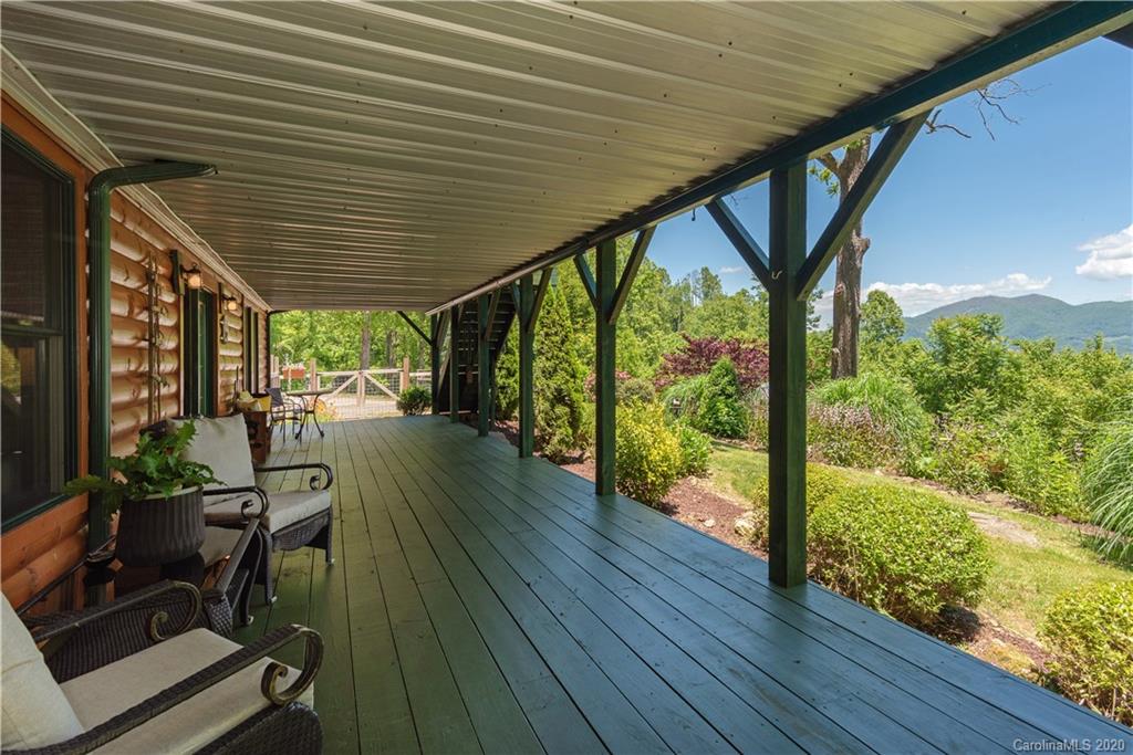 211 Lagrange Road, Unit TRACK 2 Waynesville, NC 28786 - Photo 40 of 48 a view of porch with wooden floor