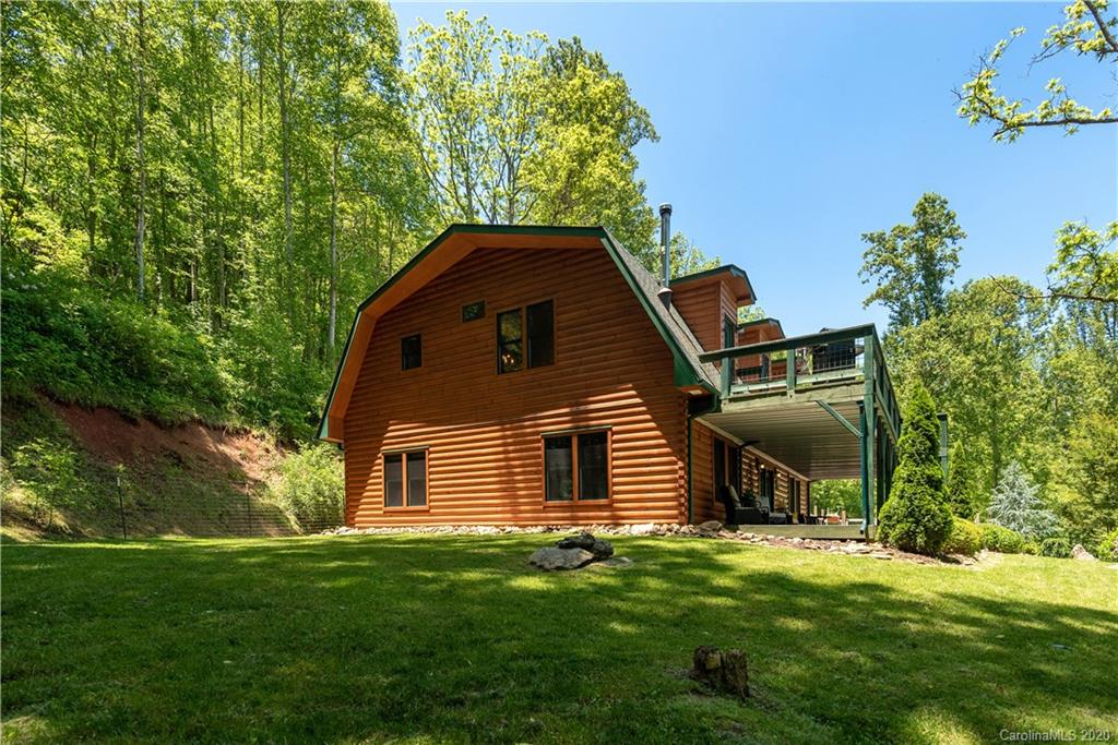 211 Lagrange Road, Unit TRACK 2 Waynesville, NC 28786 - Photo 45 of 48 a front view of a house with a garden