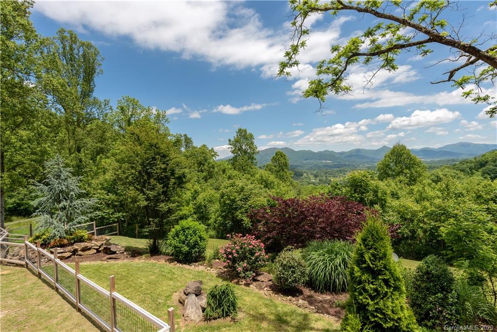 211 Lagrange Road, Unit TRACK 2 Waynesville, NC 28786 - Photo 6 of 48 a view of a backyard with plants