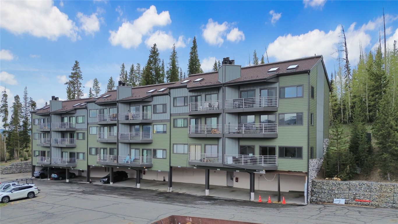 a view of a large building with a street