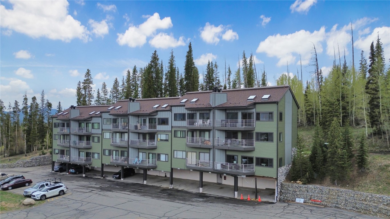 9876 Ryan Gulch Road, Unit 106 Silverthorne, CO 80498 - Photo 21 of 27 a view of a tall building
