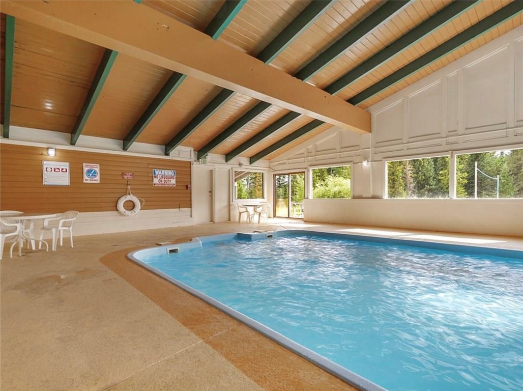 9876 Ryan Gulch Road, Unit 106 Silverthorne, CO 80498 - Photo 26 of 27 a view of a room with window and hardwood