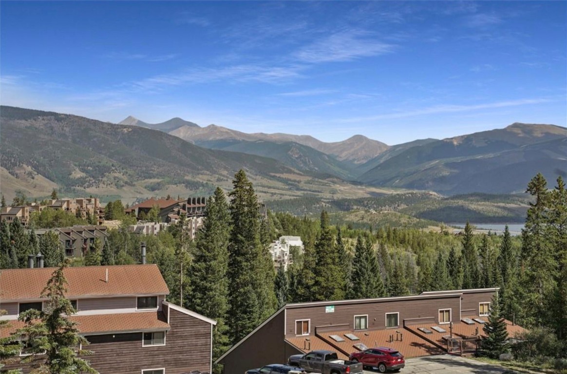 9876 Ryan Gulch Road, Unit 106 Silverthorne, CO 80498 - Photo 27 of 27 a view of a city with mountain