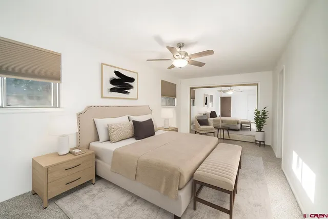 a bed room with a bed and furniture