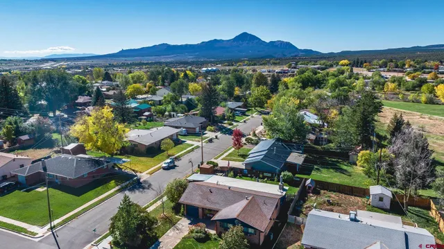 an aerial view of residential house and outdoor space