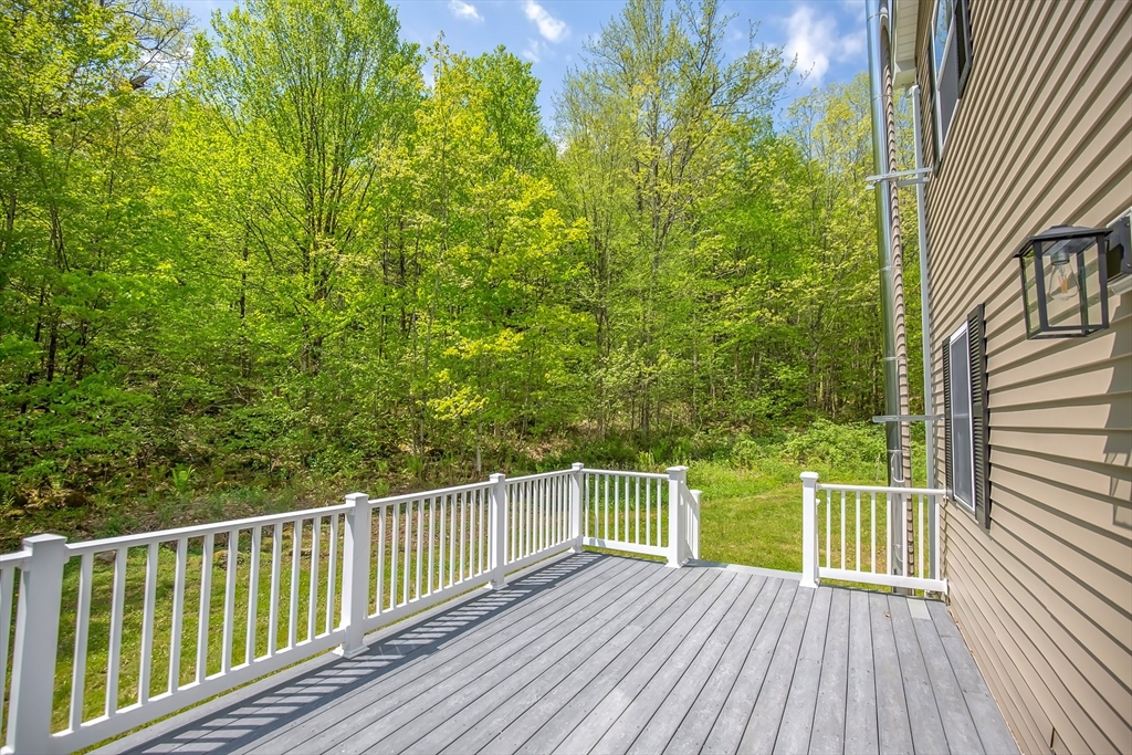 165 Sandisfield Road Sandisfield, MA 01255 - Photo 4 of 37 a view of a wooden deck
