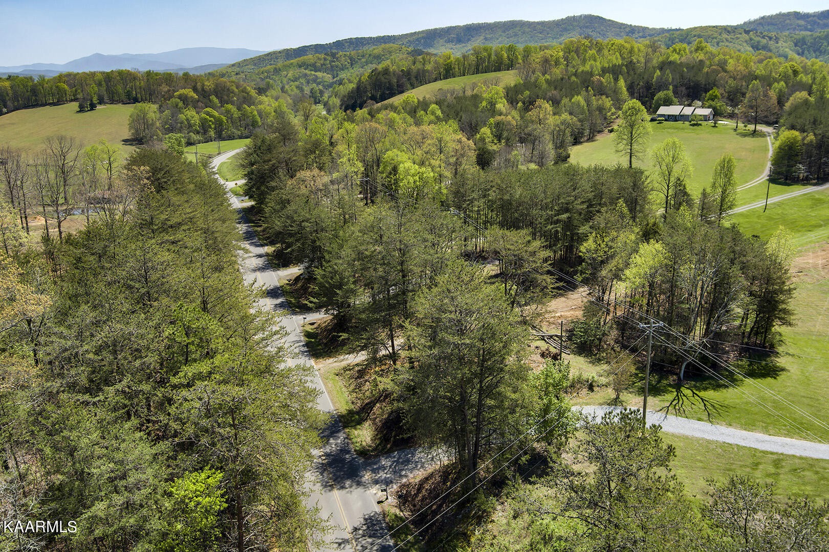 3320 Ballplay Road Tellico Plains, TN 37385 - Photo 7 of 21 a view of lake with mountain
