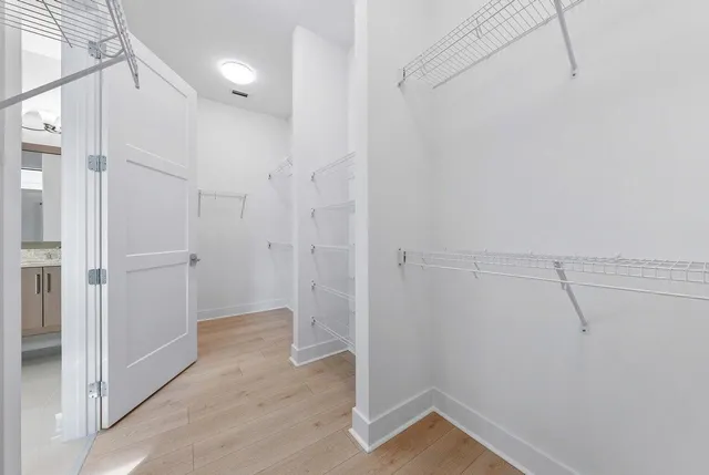 a view of a room with white walls