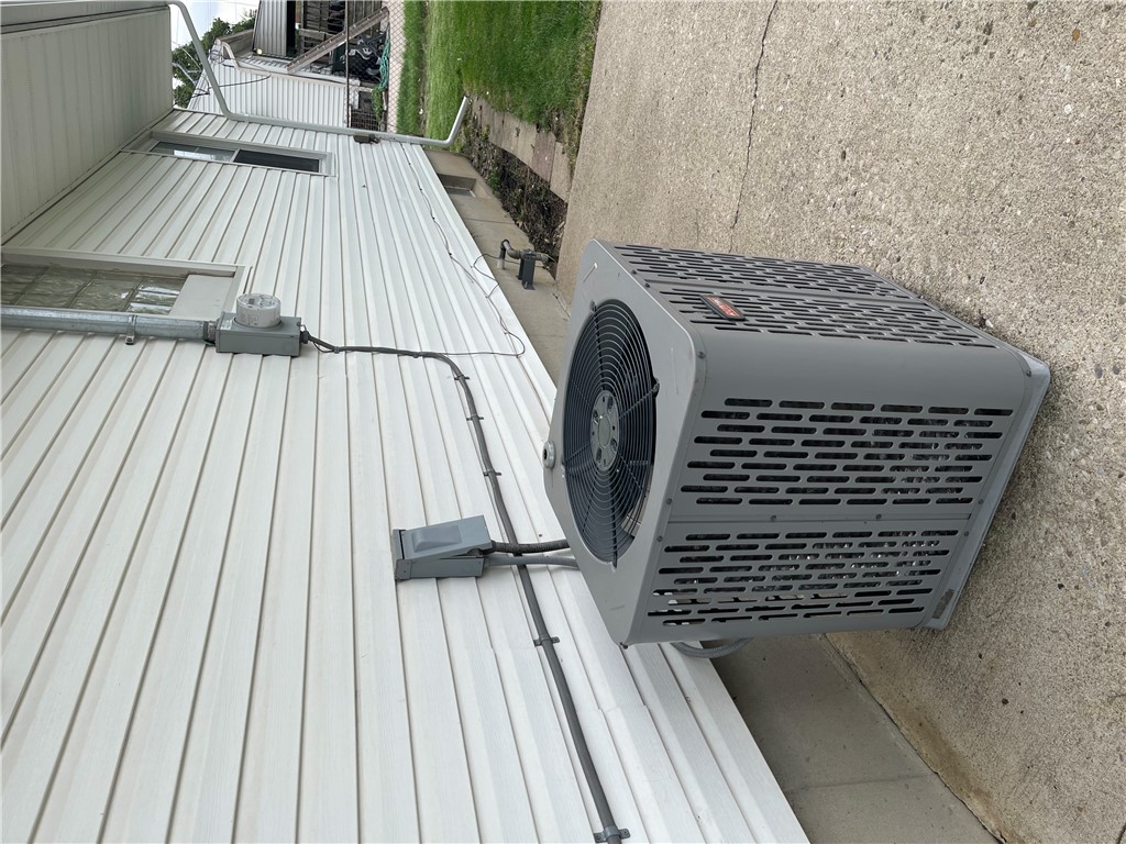 1361 Sussex Road Troy, OH 45373 - Photo 7 of 25 Essential exterior utilities include central air, providing year-round comfort.