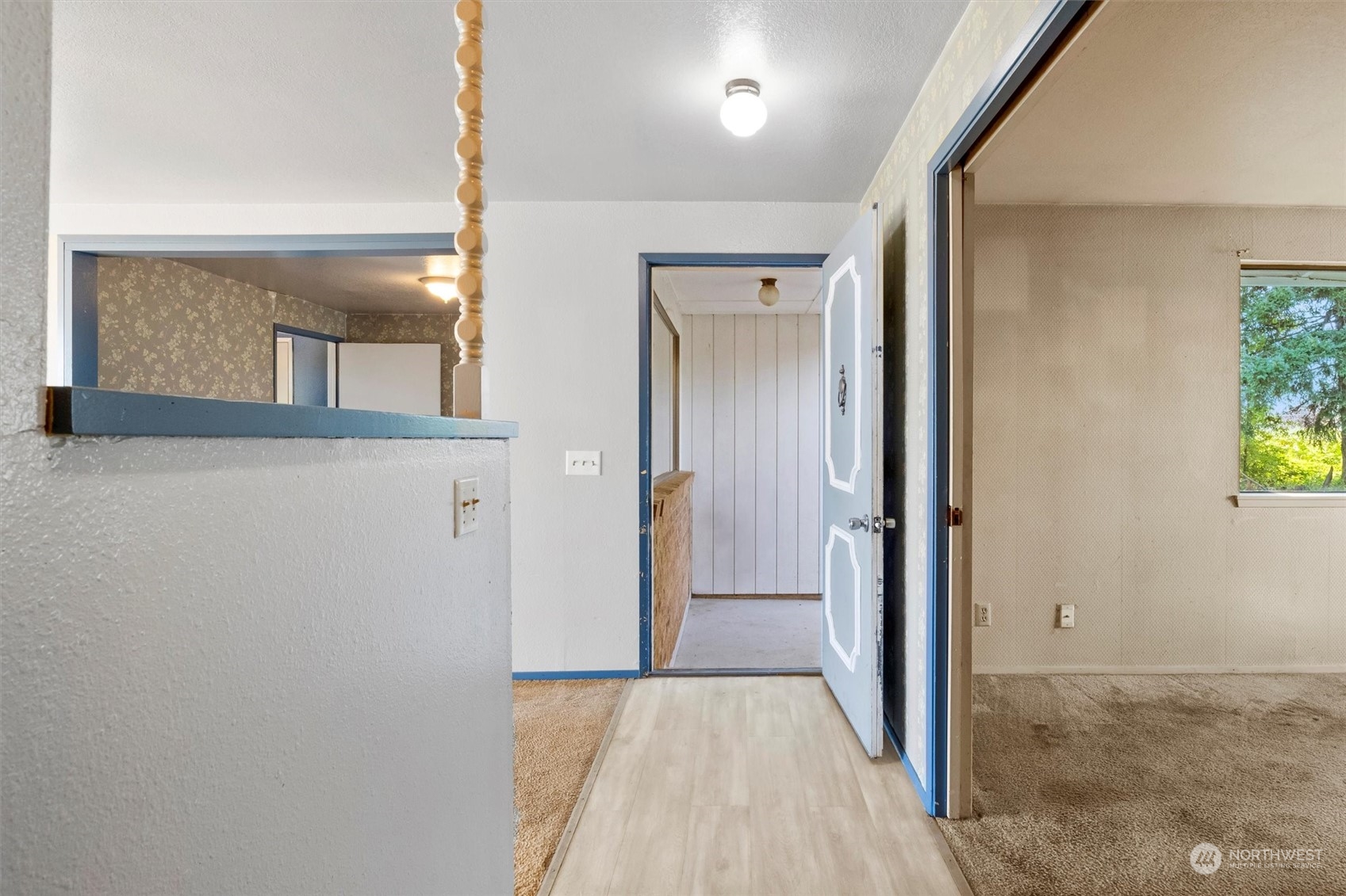 2211 Jess Road Custer, WA 98240 - Photo 17 of 33 a view of a hallway with wooden floor and a living room