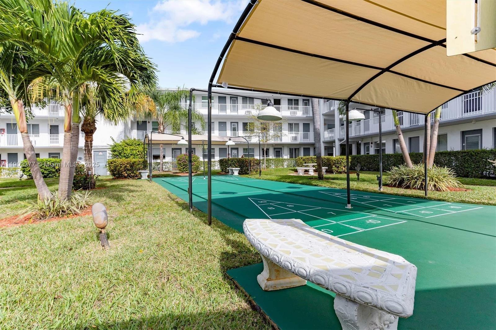 15610 Northeast 6th Avenue, Unit 32D Miami, FL 33162 - Photo 4 of 15 a view of a volley ball court