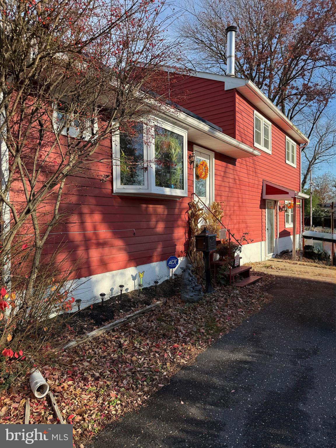 a front view of a house with yard