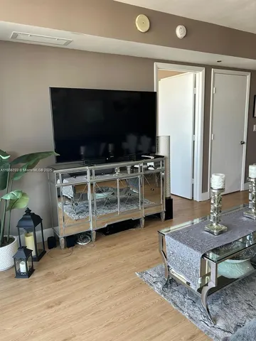 a living room with a couch and a table