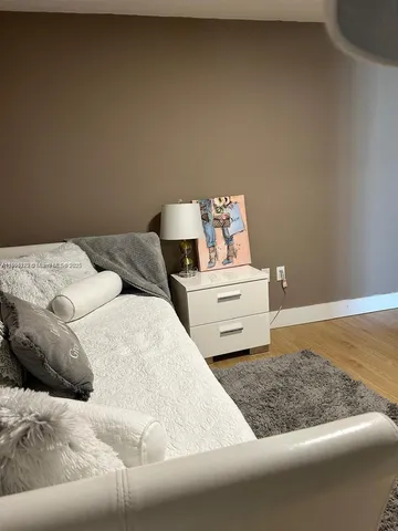 a kitchen with stainless steel appliances a refrigerator and a stove
