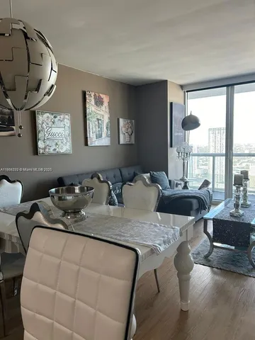 a view of a dining room with furniture