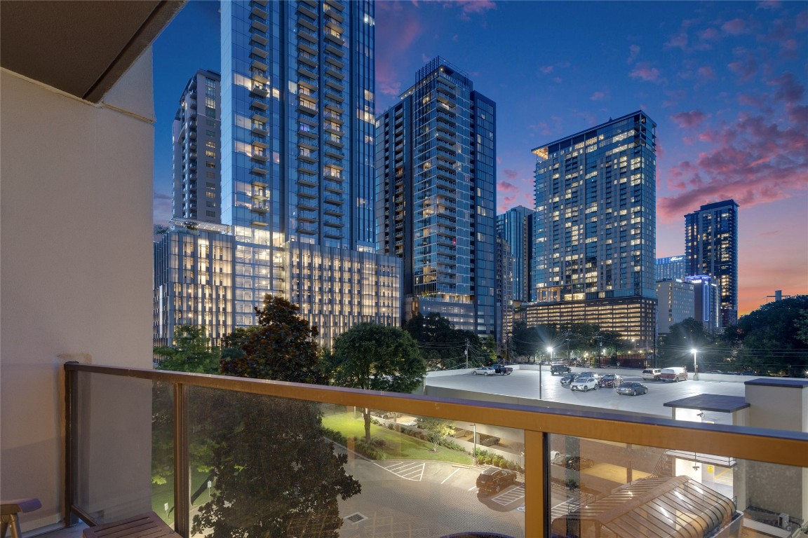 a view of swimming pool with outdoor seating