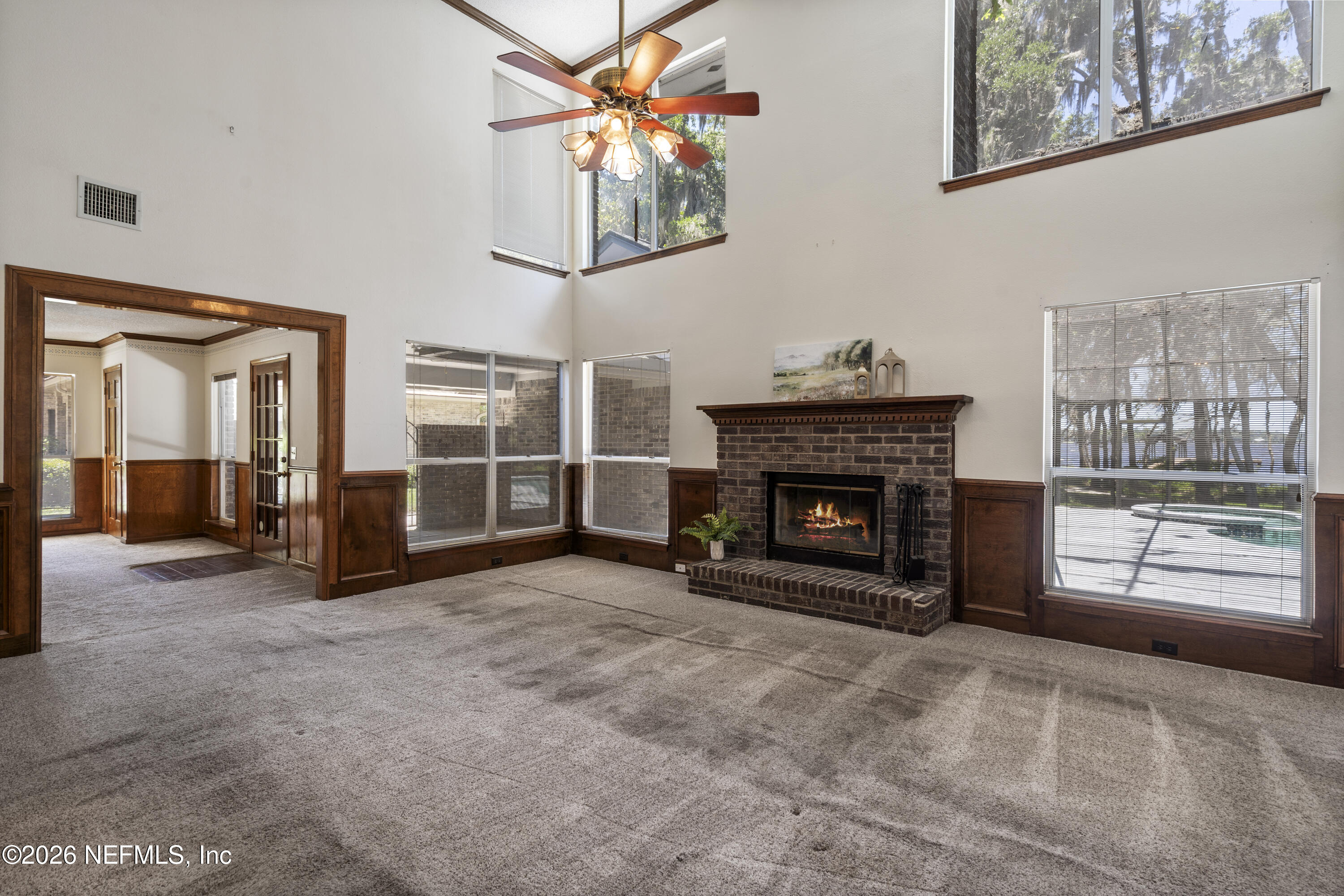 3154 Nautilus Road Middleburg, FL 32068 - Photo 22 of 61 Family Room w/ Views to Pool & Lake
