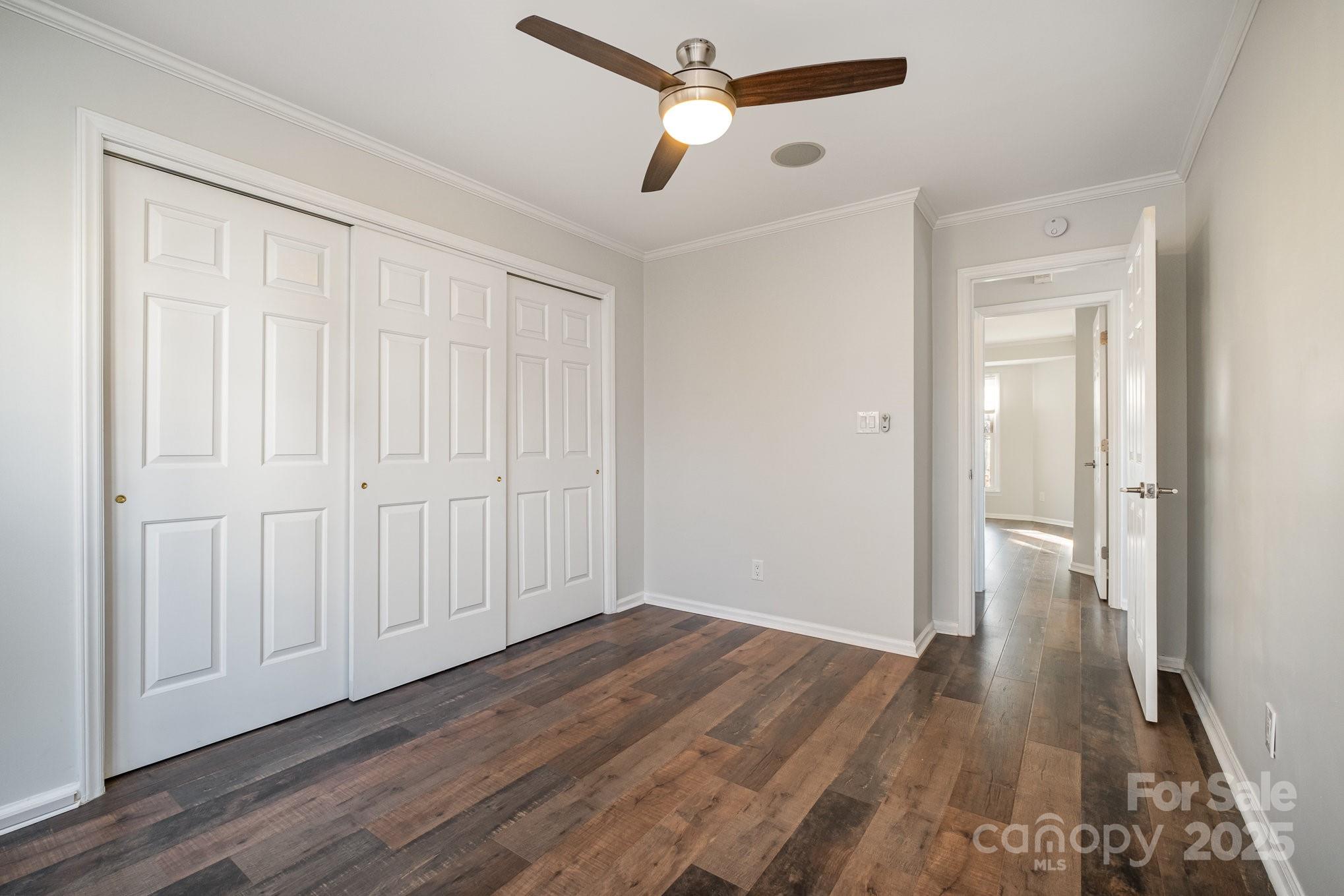 433 West 8th Street Charlotte, NC 28202 - Photo 18 of 25 a view of empty room with wooden floor