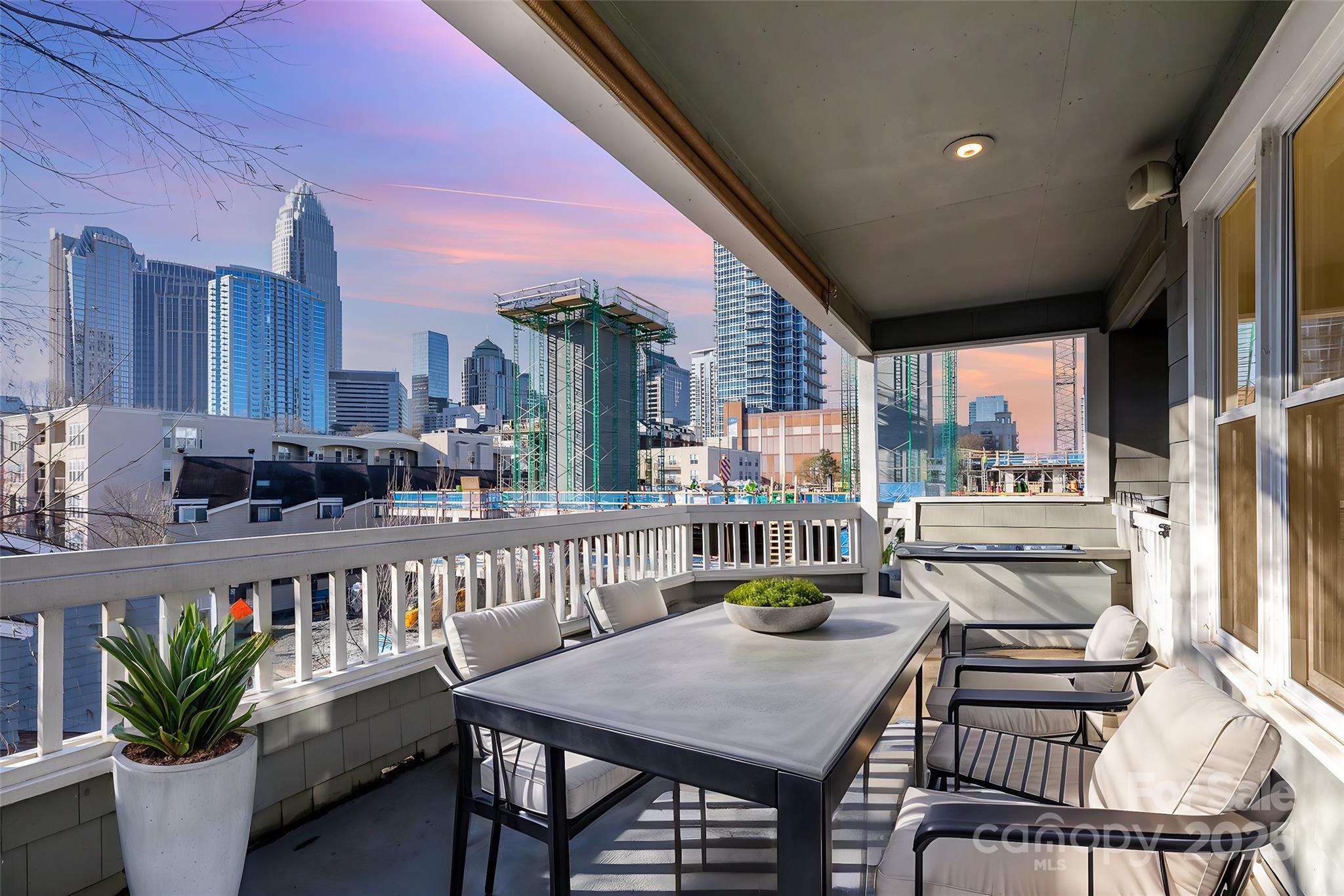 433 West 8th Street Charlotte, NC 28202 - Photo 22 of 25 a view of a dining room with furniture window and outside view