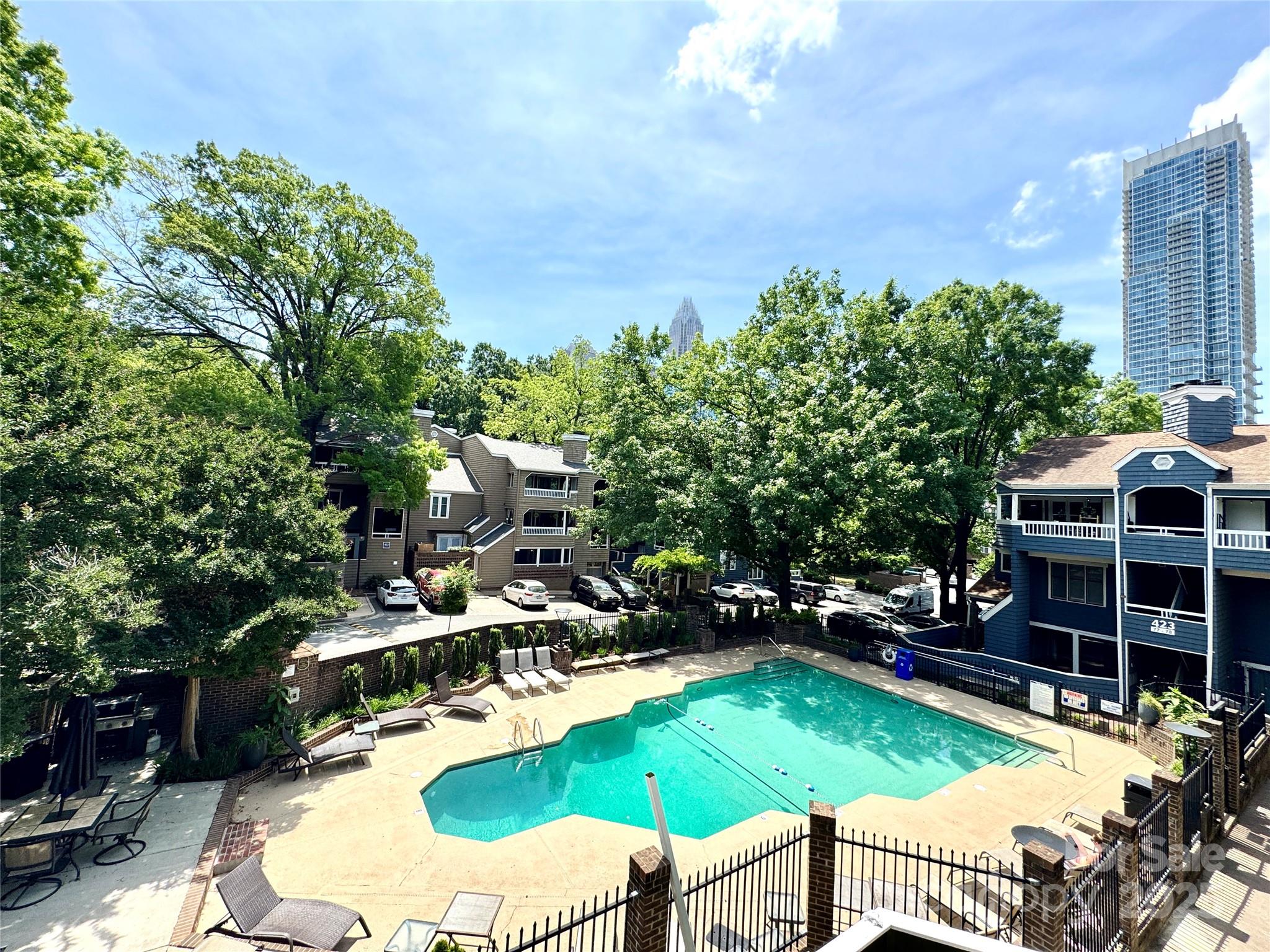 433 West 8th Street Charlotte, NC 28202 - Photo 24 of 25 a view of a swimming pool with a patio