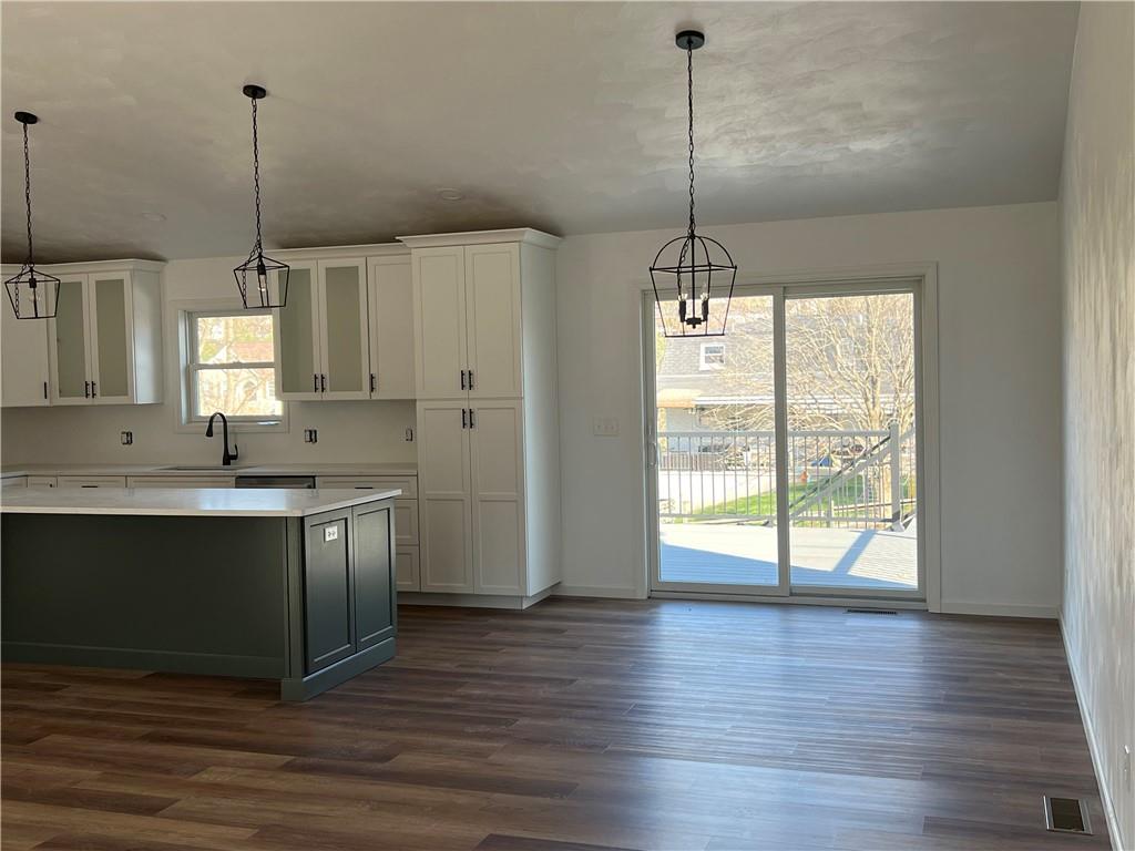 141 Illinois Drive Lower Burrell, PA 15068 - Photo 10 of 23 Dining area with glass sliding door t o 24x12 deck
