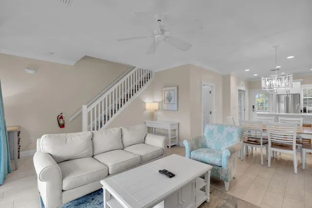 a living room with furniture and a table