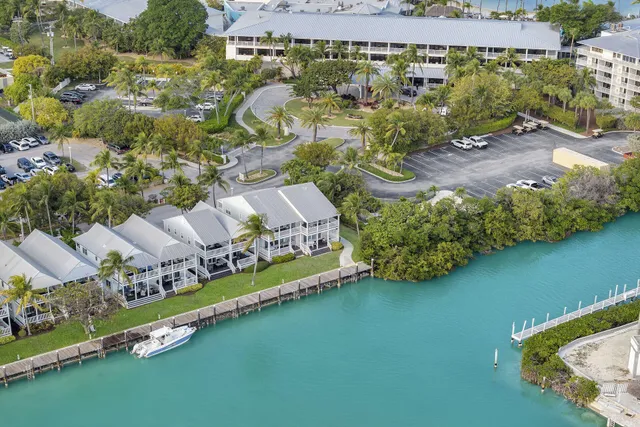 an aerial view of a house with a garden