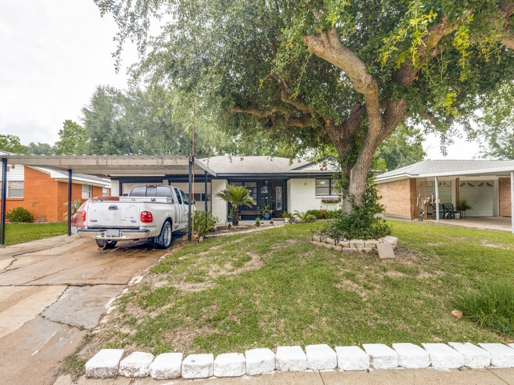 124 Bluebird Lane Pasadena, TX 77502 - Photo 23 of 25 a car parked in front of a house