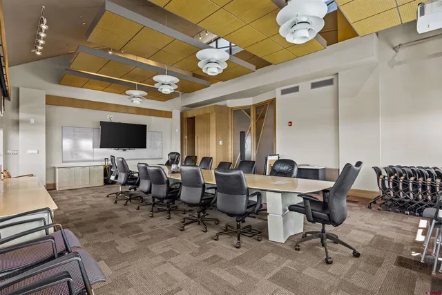 a view of a dining room with furniture