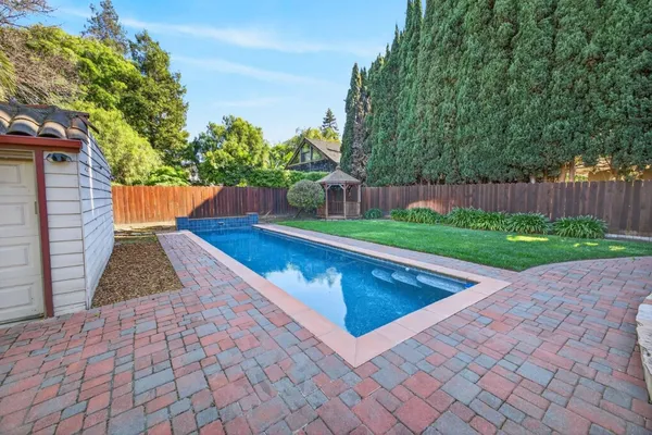 a view of a garden with a fountain