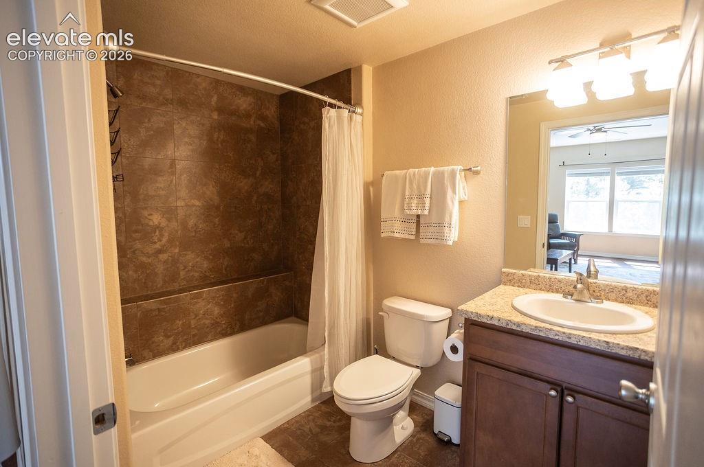 45 Valley Circle Divide, CO 80814 - Photo 25 of 42 a bathroom with a sink toilet and shower