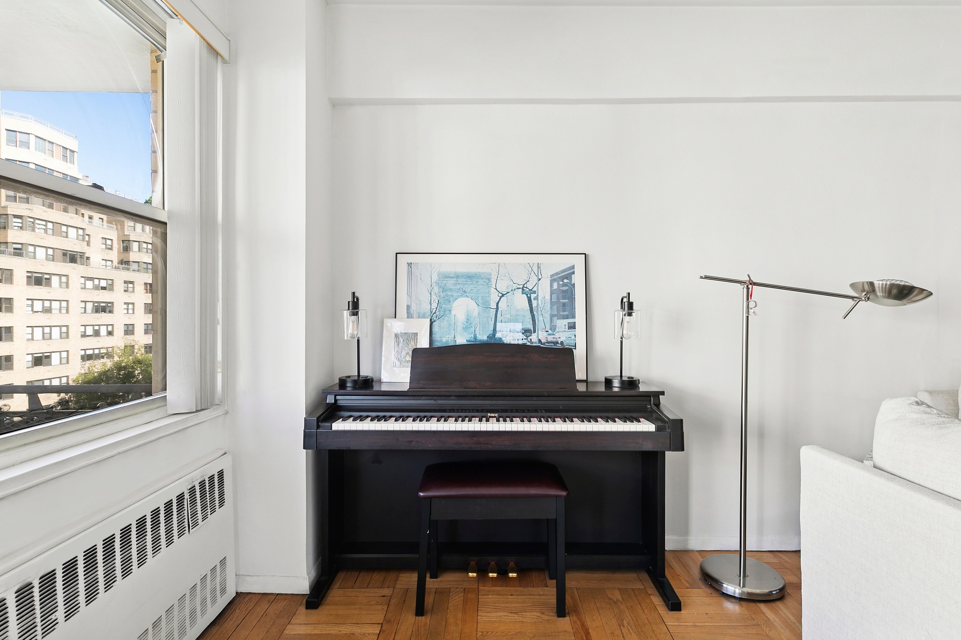 40 East 9th Street, Unit 7D Manhattan, NY 10003 - Photo 12 of 14 a view of a livingroom with furniture and front door