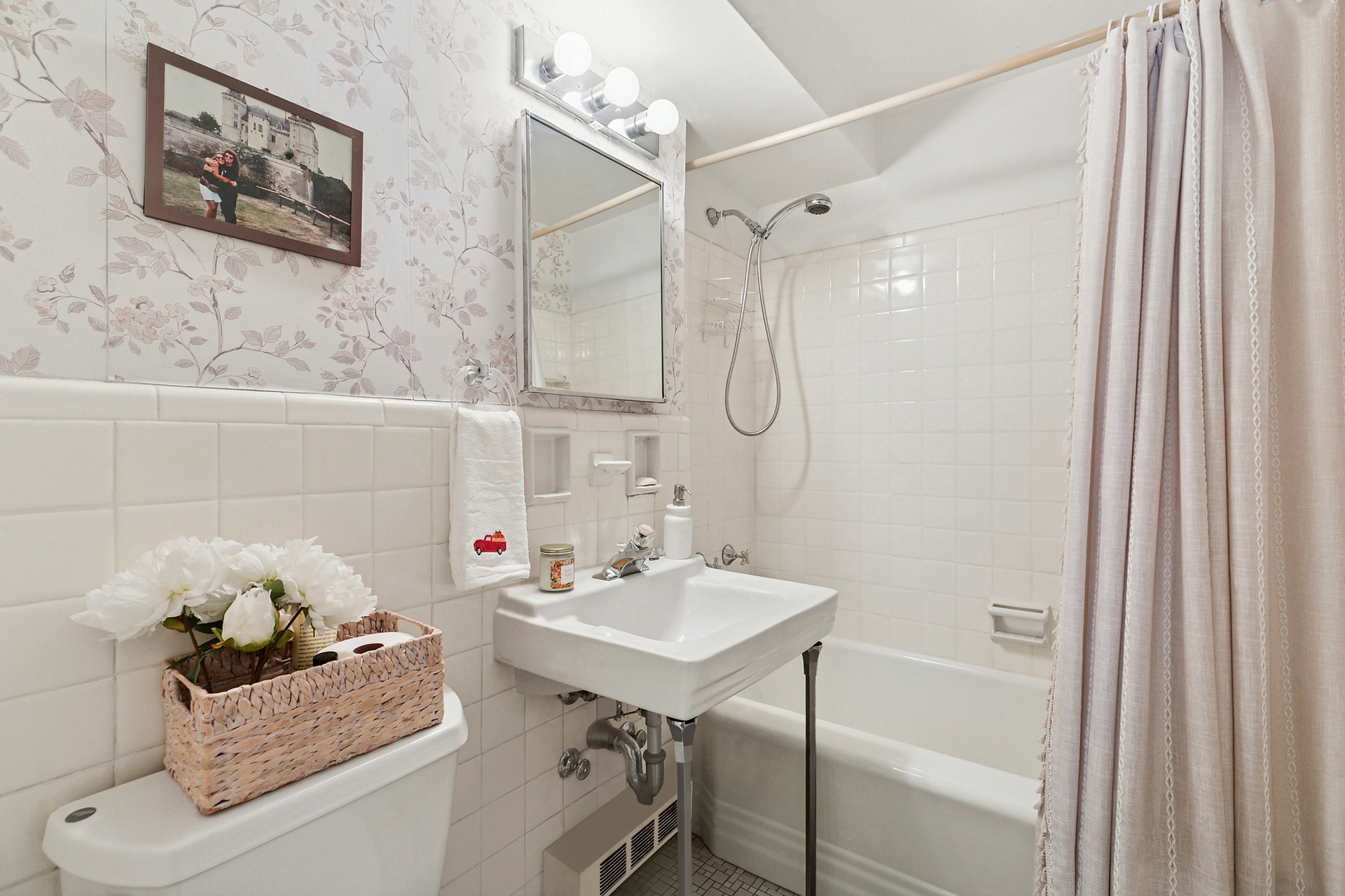 40 East 9th Street, Unit 7D Manhattan, NY 10003 - Photo 5 of 14 a bathroom with a sink vanity and tub
