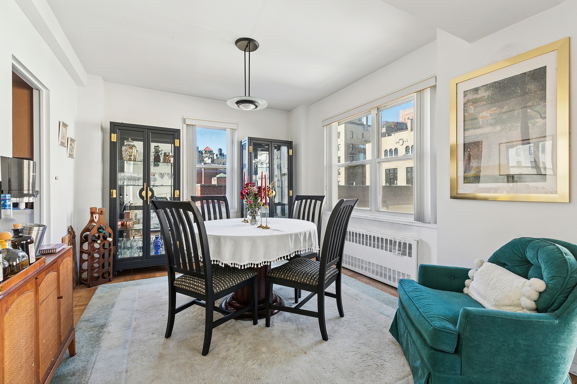 40 East 9th Street, Unit 7D Manhattan, NY 10003 - Photo 8 of 14 a view of a dining room with furniture