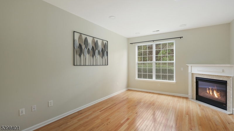 18 Truman Avenue Princeton, NJ 08540 - Photo 14 of 29 a view of an empty room with a window and a fireplace