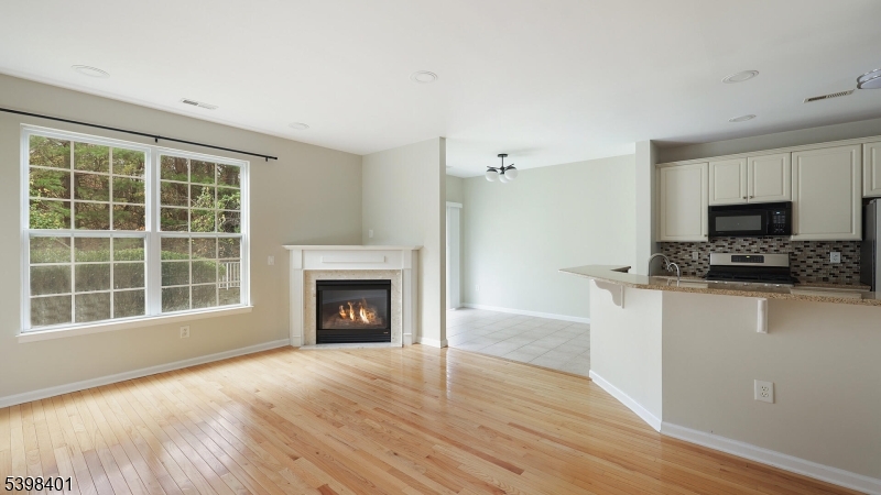 18 Truman Avenue Princeton, NJ 08540 - Photo 15 of 29 a view of an empty room with a window and fireplace