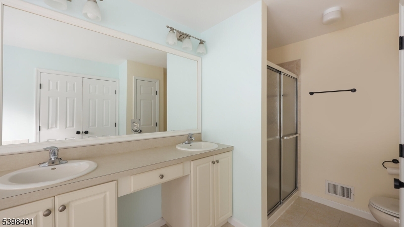 18 Truman Avenue Princeton, NJ 08540 - Photo 21 of 29 a bathroom with a sink and a mirror