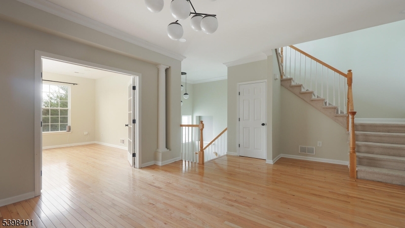 18 Truman Avenue Princeton, NJ 08540 - Photo 6 of 29 a view of empty room with wooden floor and fan