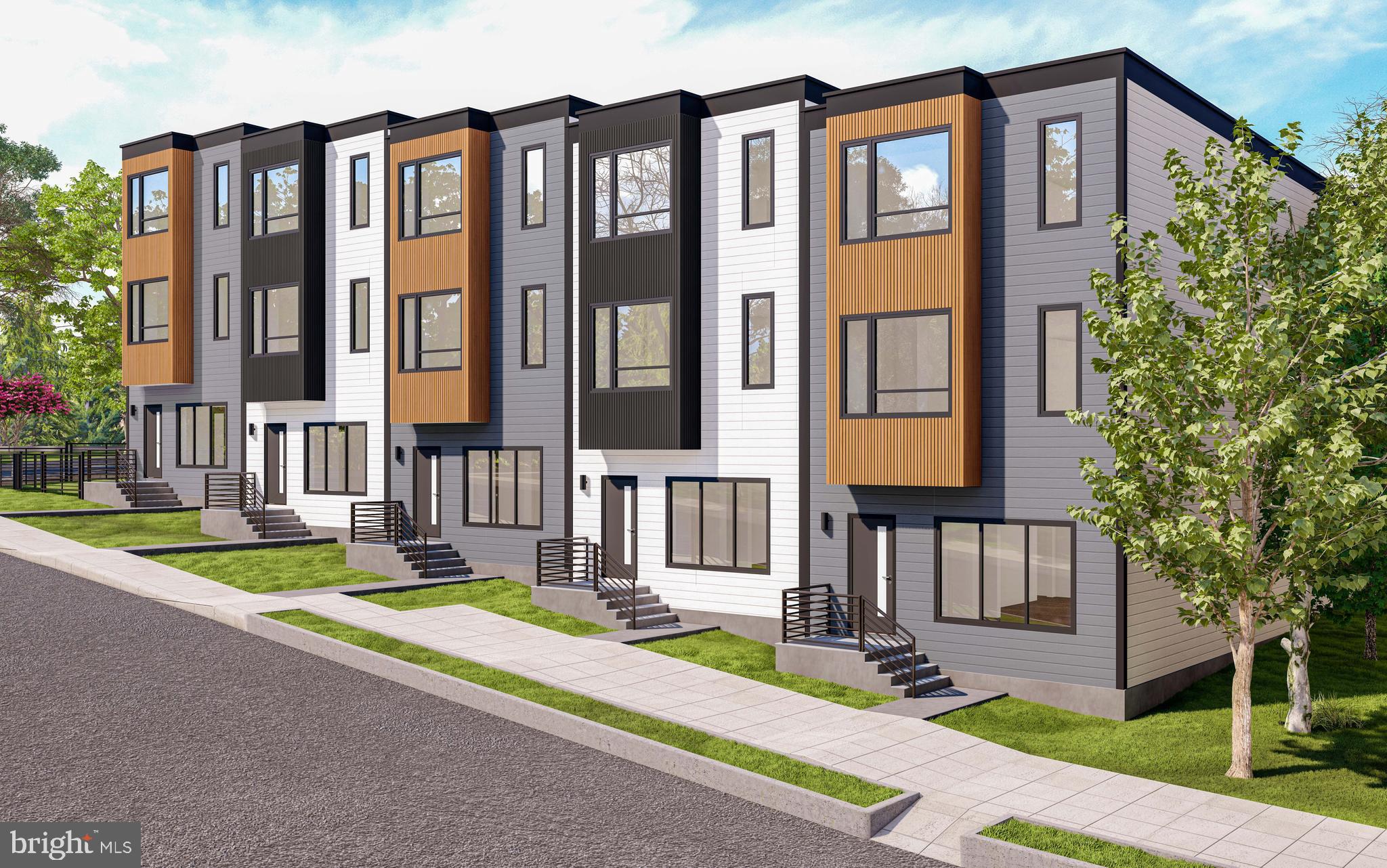 5219 F Street Southeast Washington, DC 20019 - Photo 2 of 5 a view of a brick building next to a yard