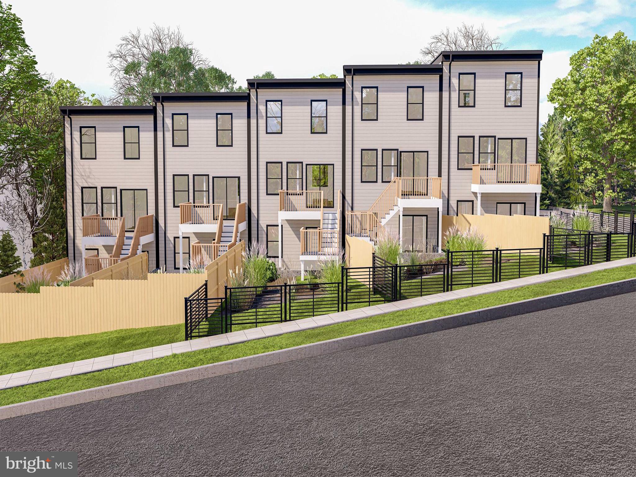 5219 F Street Southeast Washington, DC 20019 - Photo 5 of 5 a view of a house with a yard and fence